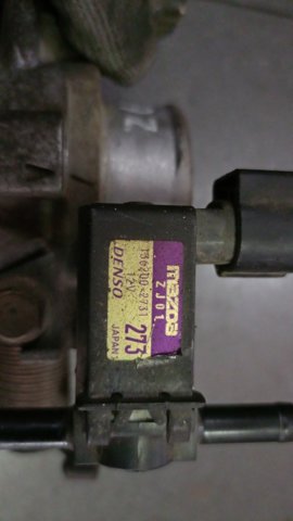 Клапан вакуумный