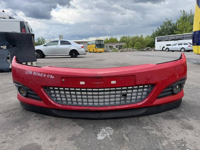 Передний бампер 1400334 GM