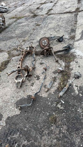 Рычаг (тяга) задней подвески продольный нижний левый