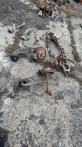 Рычаг (тяга) задней подвески продольный нижний левый