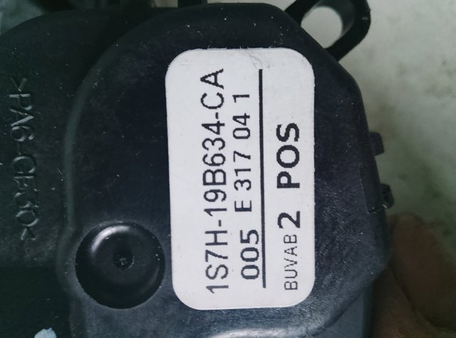 Двигун заслінки печі