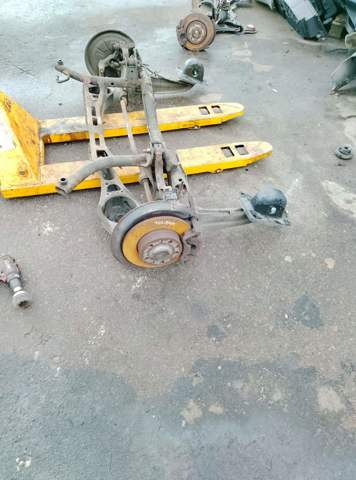 Амортизатор задній