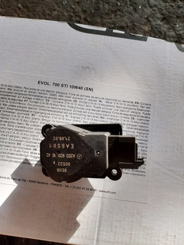 Двигун заслінки печі