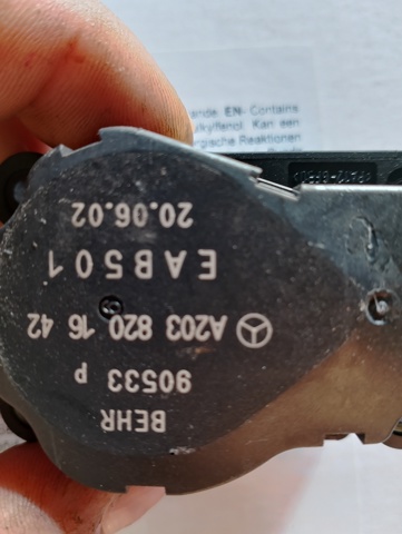 Двигун заслінки печі