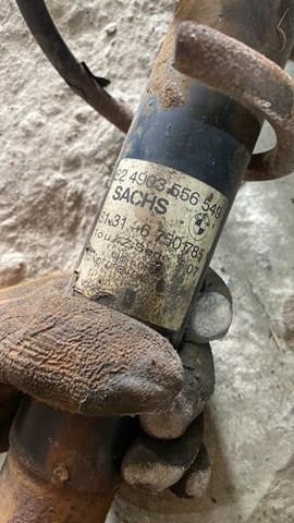 Амортизатор передний левый