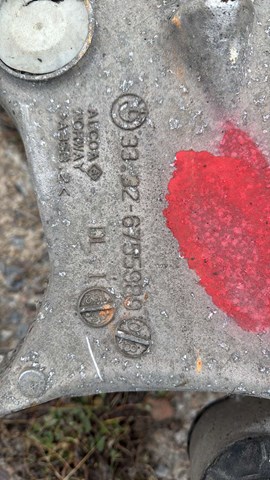 Рычаг задней подвески нижний левый