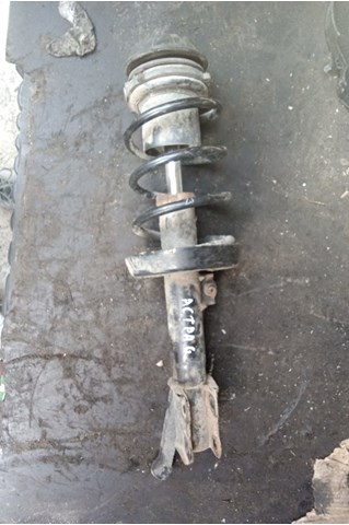 Амортизатор передний левый