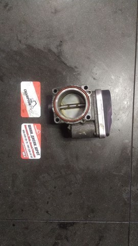 Дросільна заслінка в зборі