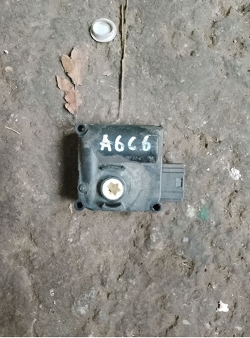 Двигун заслінки печі