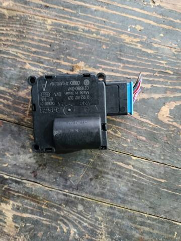 Двигун заслінки печі