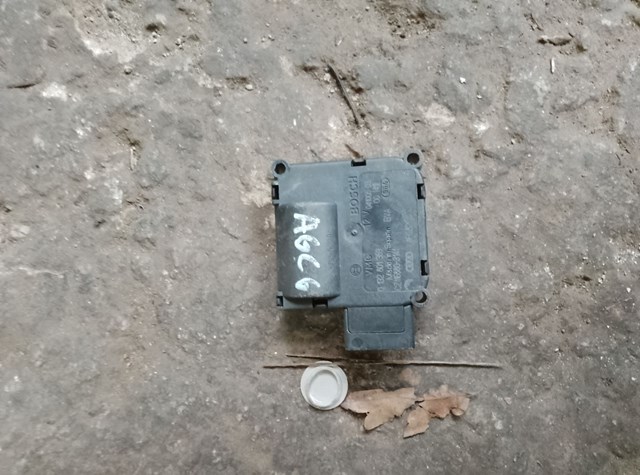 Двигун заслінки печі