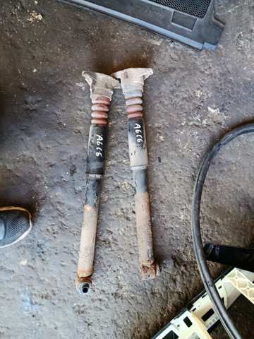 Амортизатор задній