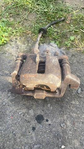 Суппорт тормозной задний левый