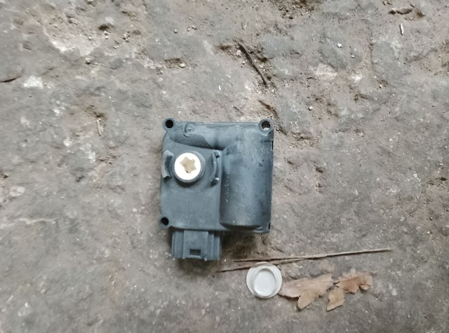 Двигун заслінки печі