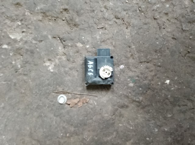 Двигун заслінки печі