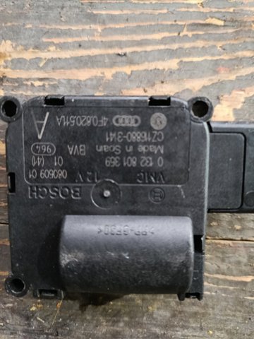 Двигун заслінки печі