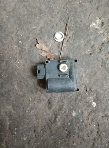 Двигун заслінки печі