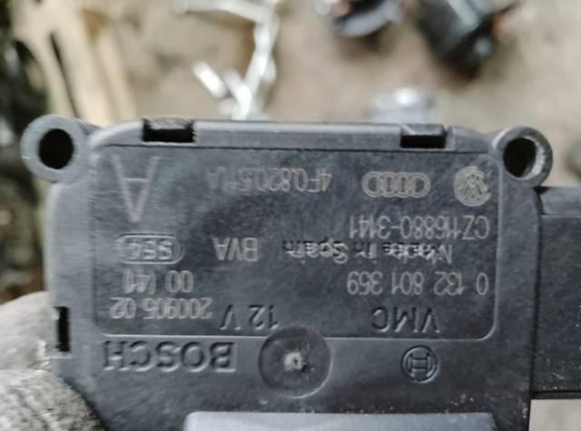 Двигун заслінки печі