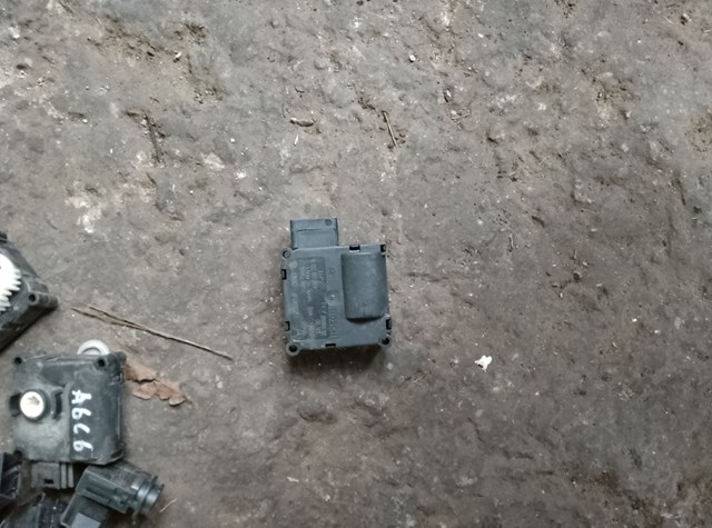 Двигун заслінки печі