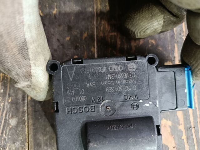 Двигун заслінки печі