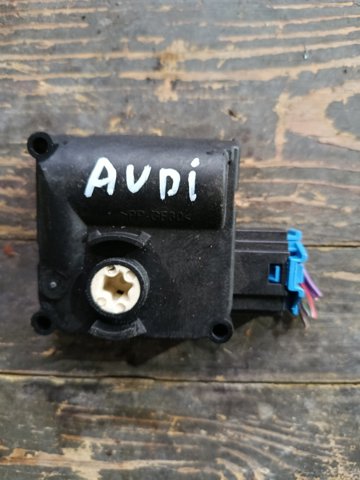 Двигун заслінки печі