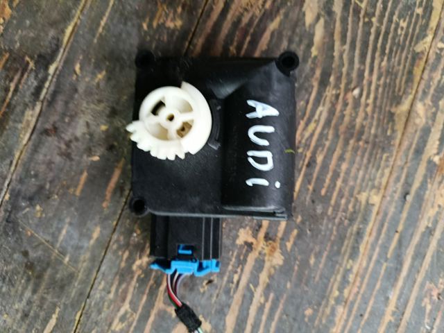 Двигун заслінки печі