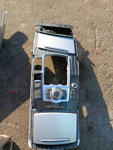 Попільничка центральної консолі — фото 11