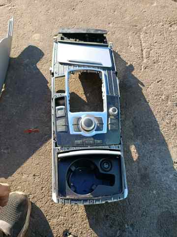 Попільничка центральної консолі — фото 10