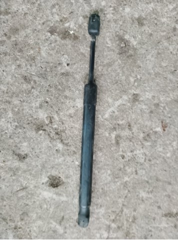 Амортизатор кришки