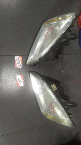 Крышка фары левой