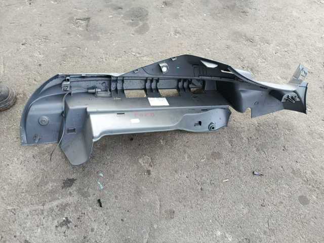 Утримувач задньої полиці