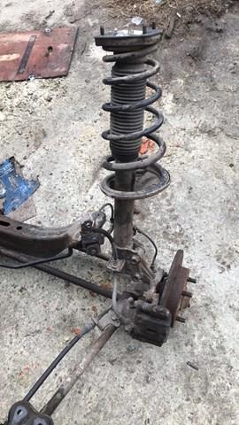 Цапфа (поворотный кулак) задний левый