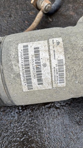Амортизатор задний левый