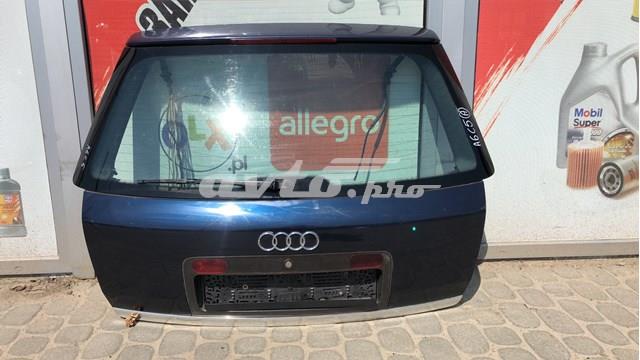 Замок крышки багажника 8D9827565 VAG