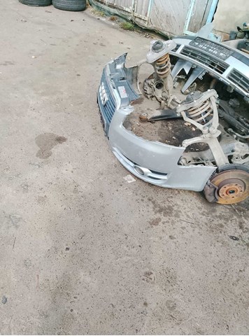 Бампер передній