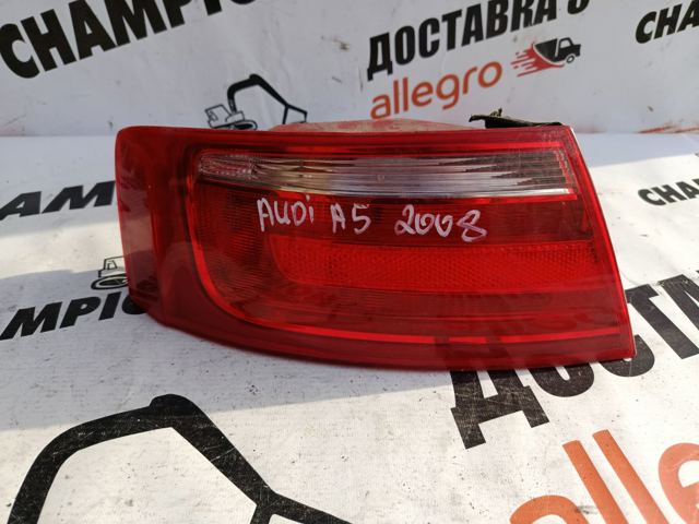 Задний левый внешний фонарь 8T0945095 VAG