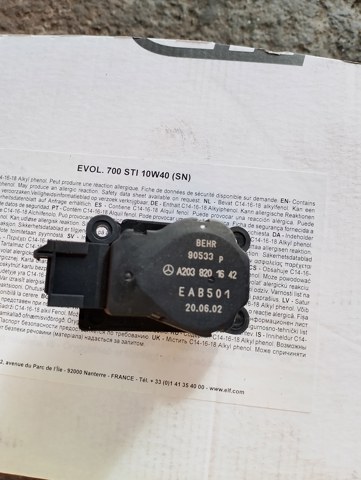 Двигун заслінки печі