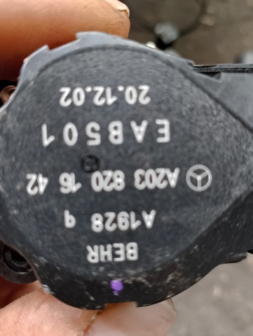 Двигун заслінки печі