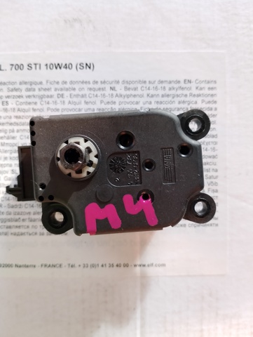 Двигун заслінки печі