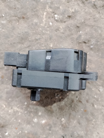 Двигун заслінки печі