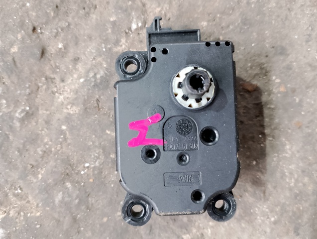 Двигун заслінки печі