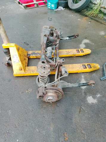 Амортизатор задній