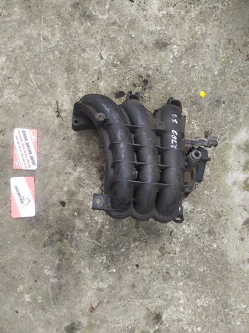 Колектор впускний