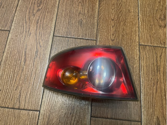 Задний левый внешний фонарь 6L6945095A VAG