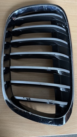 Решетка радиатора левая 7354823 BMW