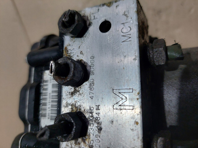 Гидроблок АБС 476609U000 NISSAN