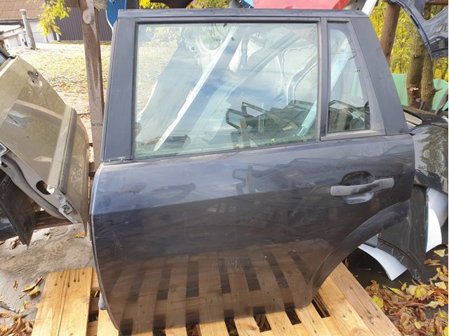 FORD 1303633 Стекло двери задней левой в наличии Винница