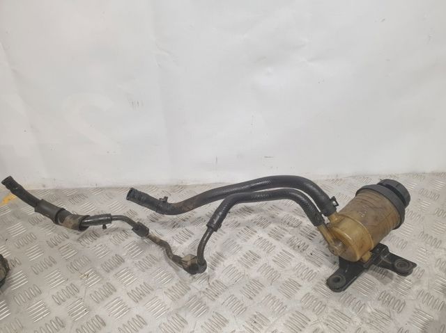 Шланг ГУР, низкого давления, от радиатора к бачку 575702E001 HYUNDAI