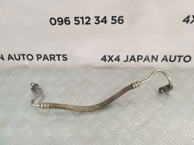 Шланг кондиционера, от компрессора к радиатору 92490CA000 NISSAN