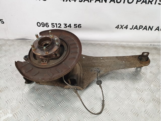 Кулак поворотный правый EH4428200 MAZDA